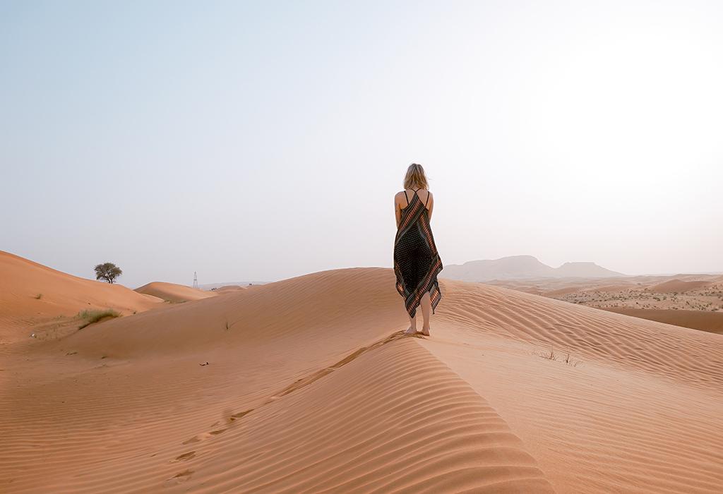woman-on-the-desert-sand-of-Merzouga