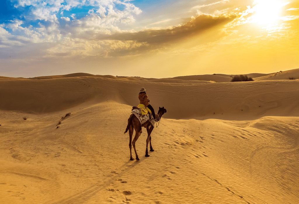 women-riding-camel-alone-at-desert-of-merzouga-best-tour-of-morocco-